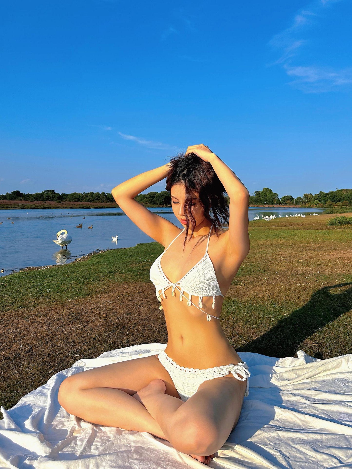 boho crochet bikini seaside styling model sitting pose